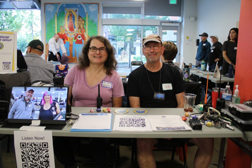 Club members at their table at the South Seattle Club Fair